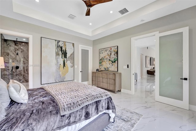 bedroom featuring visible vents, marble finish floor, recessed lighting, baseboards, and a raised ceiling