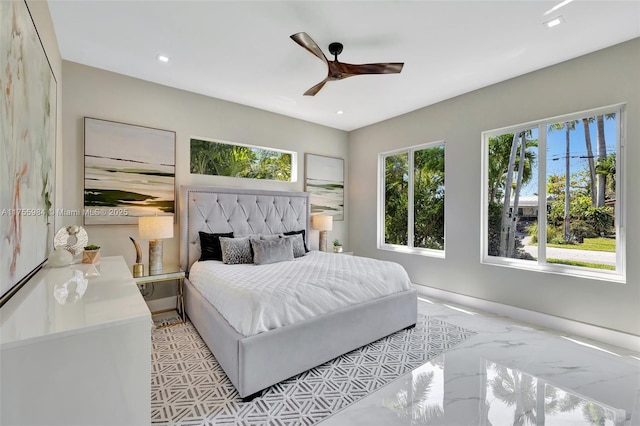 bedroom with recessed lighting, baseboards, marble finish floor, and ceiling fan