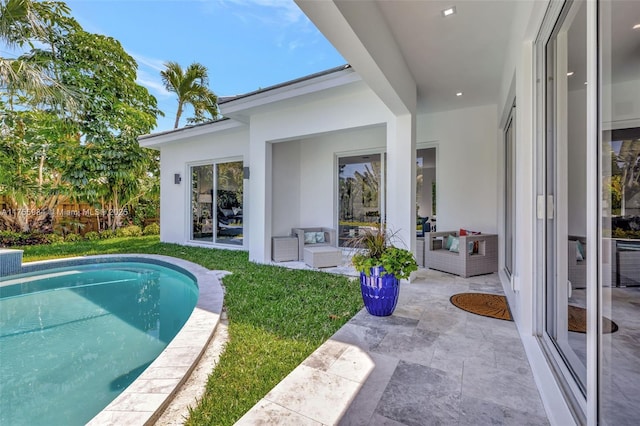 4440 NE 15th Ter, Oakland Park, FL 33334 - pool featuring a lawn, an outdoor living space, and a patio area