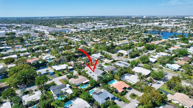 4440 NE 15th Ter, Oakland Park, FL 33334 - drone / aerial view with a residential view and a water view