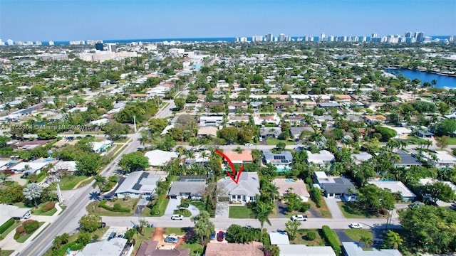 aerial view with a water view and a city view