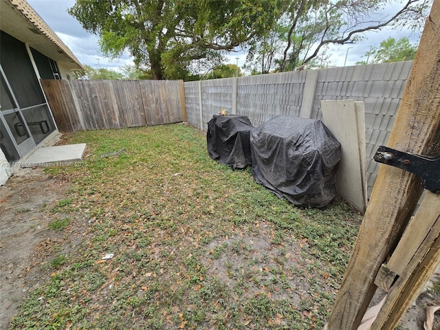 view of yard featuring a fenced backyard