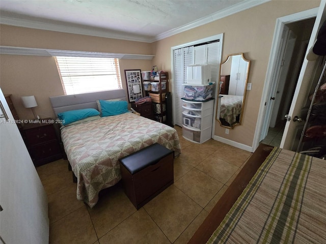 tiled bedroom featuring crown molding and baseboards