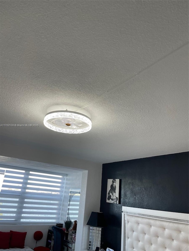 18555 NE 14th Ave Unit 609, Miami, FL 33179 - room details featuring a textured ceiling