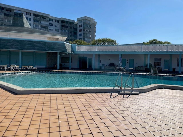 18555 NE 14th Ave Unit 609, Miami, FL 33179 - community pool featuring a patio area