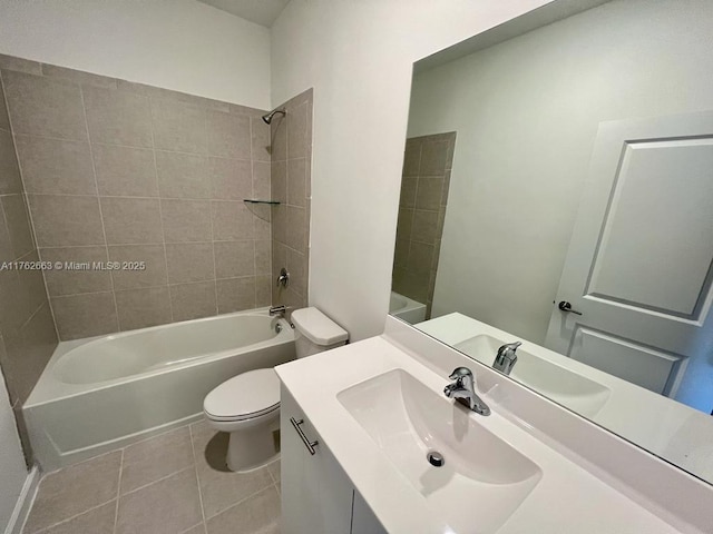 full bath with tile patterned flooring, vanity, toilet, and shower / tub combination