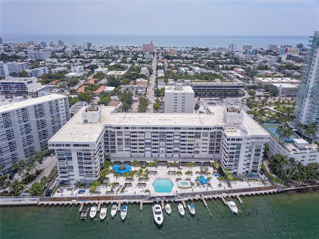 aerial view with a city view and a water view