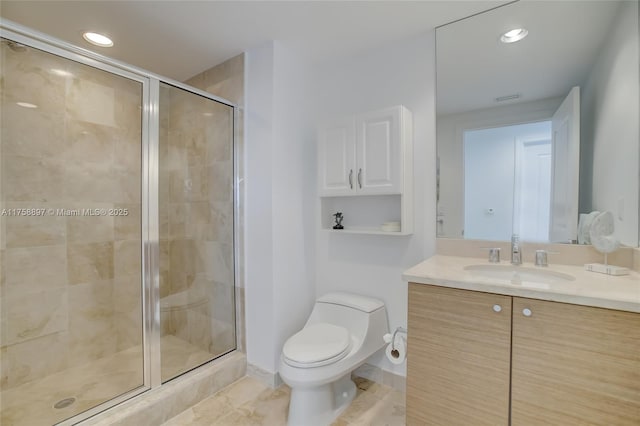 bathroom featuring vanity, baseboards, recessed lighting, a stall shower, and toilet