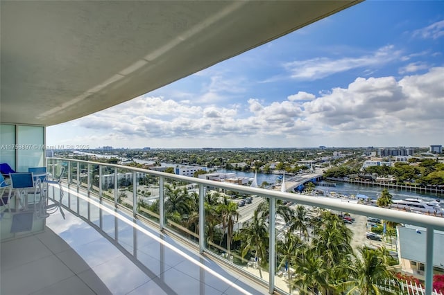 balcony with a city view and a water view