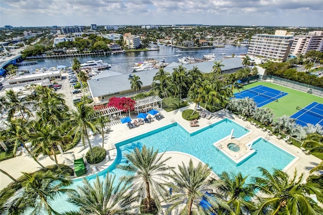 drone / aerial view featuring a water view and a city view