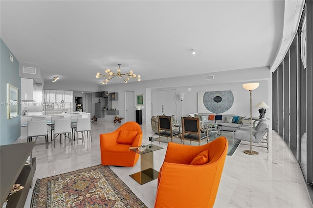 5500 Island Estates Dr Unit 604, Aventura, FL 33160 - living area featuring a notable chandelier, visible vents, and marble finish floor