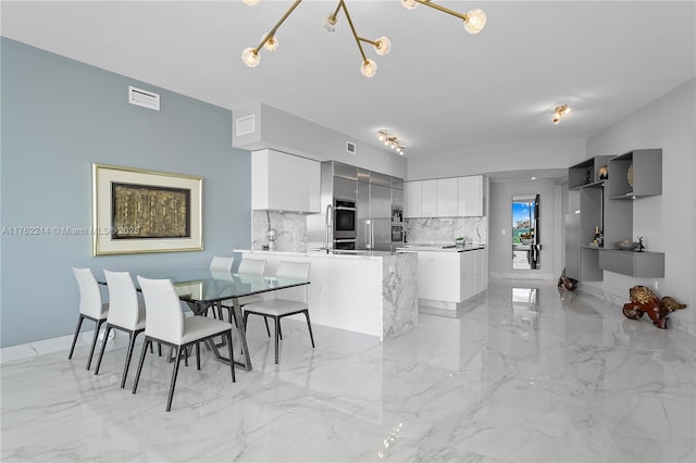 5500 Island Estates Dr Unit 604, Aventura, FL 33160 - dining space with marble finish floor