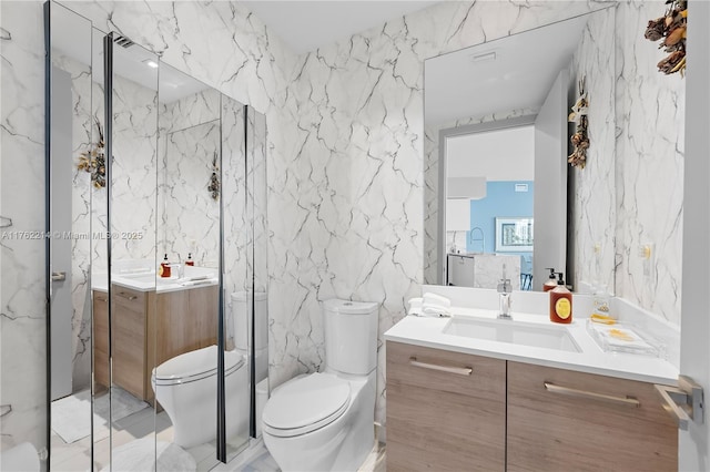 5500 Island Estates Dr Unit 604, Aventura, FL 33160 - full bathroom with a marble finish shower, toilet, stone wall, and vanity
