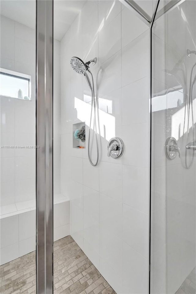 bathroom featuring a stall shower