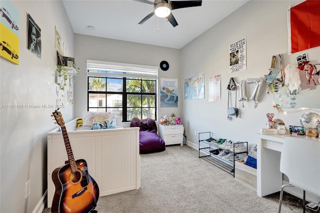 bedroom featuring baseboards, carpet floors, and ceiling fan