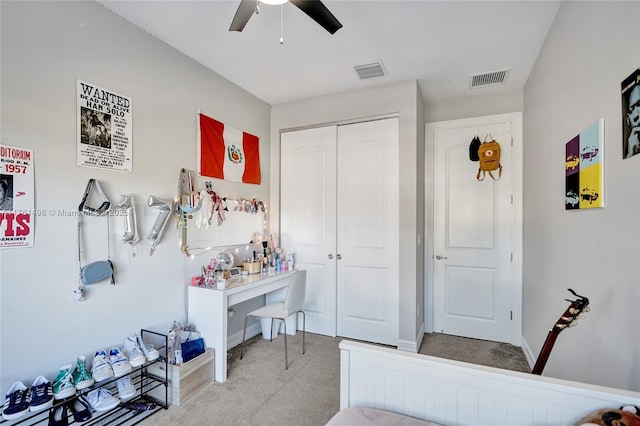 bedroom with a closet, baseboards, carpet, and visible vents