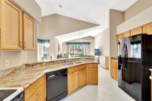 kitchen featuring black appliances, a sink, a peninsula, light tile patterned floors, and vaulted ceiling