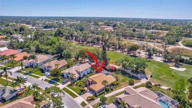 aerial view featuring a residential view and golf course view