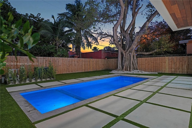 view of pool with a fenced in pool, a patio, and a fenced backyard