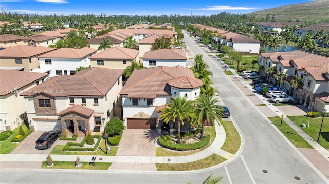 birds eye view of property with a residential view