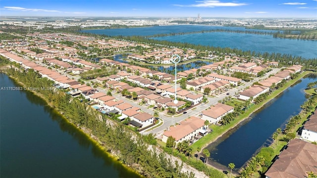 aerial view featuring a water view and a residential view