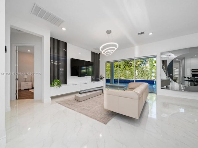 living area featuring recessed lighting, visible vents, baseboards, and marble finish floor