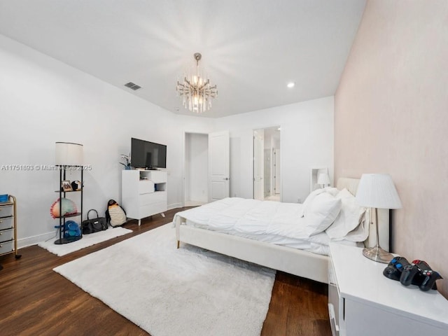 bedroom featuring visible vents, dark wood-type flooring, baseboards, recessed lighting, and a notable chandelier