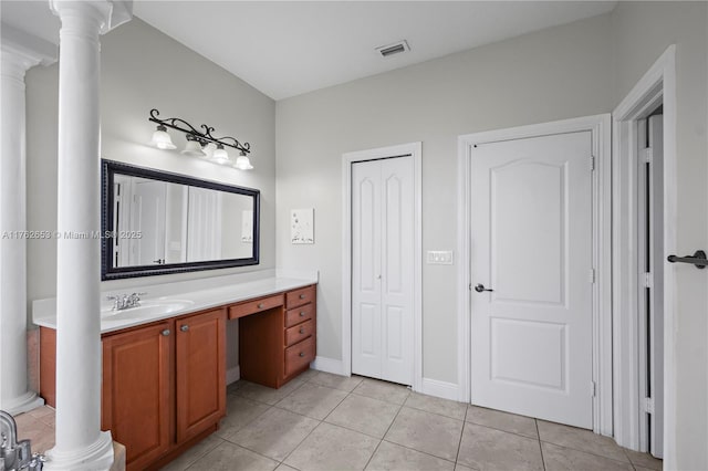 bathroom featuring tile patterned flooring, decorative columns, vanity, and visible vents