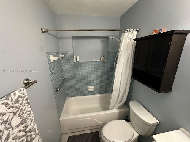 bathroom with tile patterned floors, toilet, and shower / tub combo