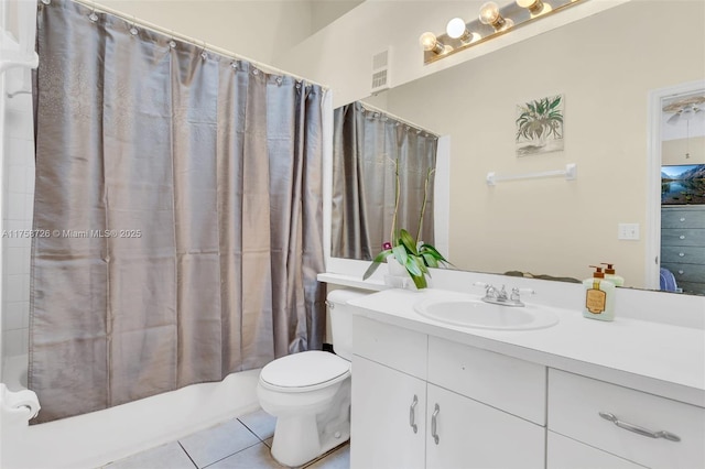 12140 Bruceton Way Unit 102, Orlando, FL 32828 - full bath featuring tile patterned floors, vanity, shower / bathtub combination with curtain, toilet, and visible vents