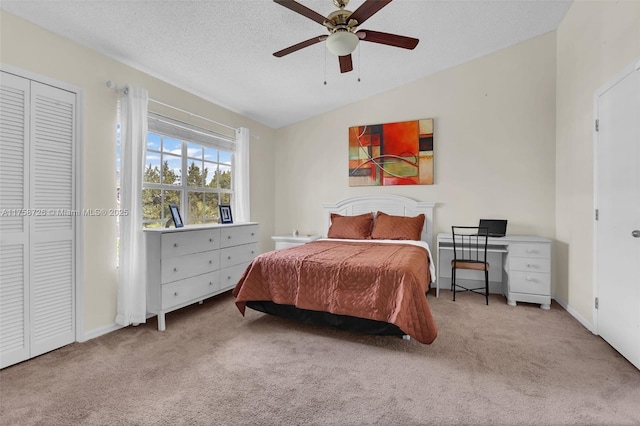 12140 Bruceton Way Unit 102, Orlando, FL 32828 - carpeted bedroom with lofted ceiling, a textured ceiling, a ceiling fan, and baseboards