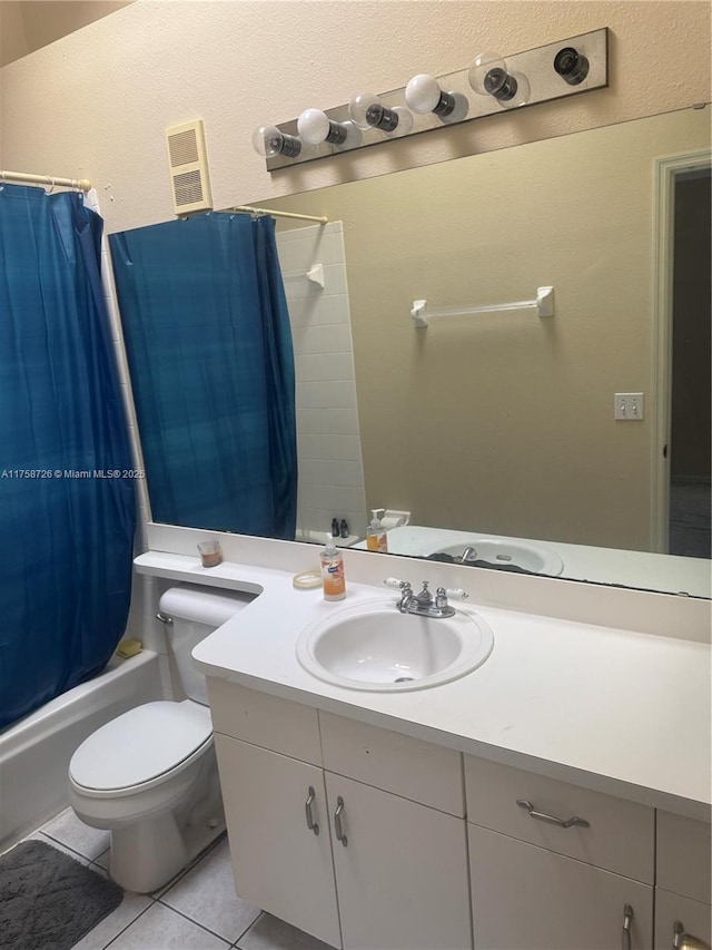 bathroom with tile patterned floors, toilet, shower / tub combo with curtain, and vanity