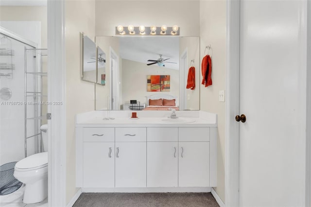 12140 Bruceton Way Unit 102, Orlando, FL 32828 - bathroom featuring a shower stall, toilet, a ceiling fan, and baseboards