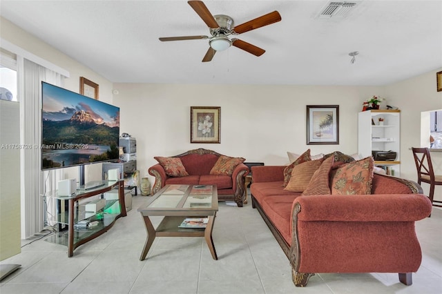 12140 Bruceton Way Unit 102, Orlando, FL 32828 - living area featuring ceiling fan and visible vents