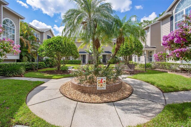 12140 Bruceton Way Unit 102, Orlando, FL 32828 - view of home's community with a lawn