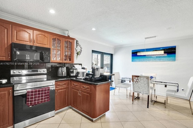 kitchen with a peninsula, stainless steel electric range, black microwave, and ornamental molding