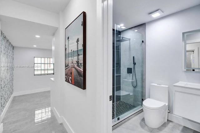 bathroom with toilet, recessed lighting, a shower stall, baseboards, and vanity