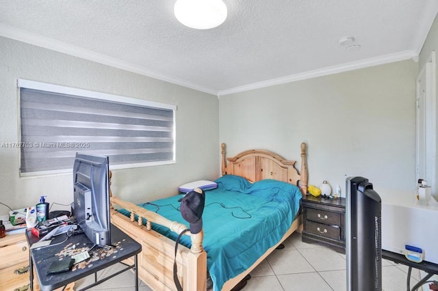 tiled bedroom with a textured ceiling and ornamental molding