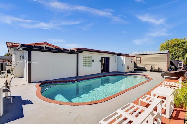 outdoor pool with a patio