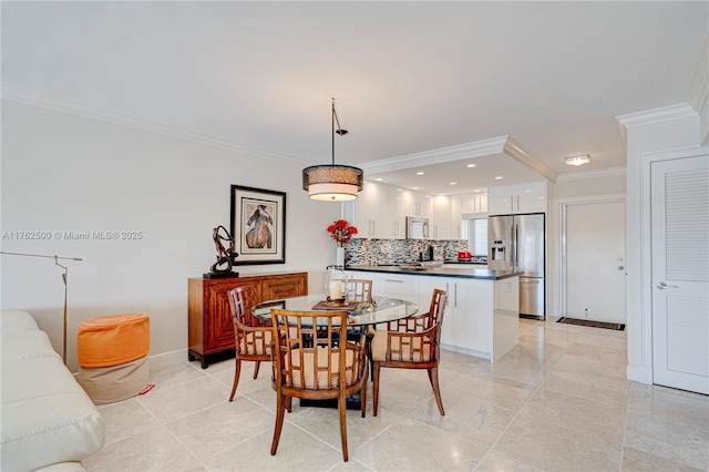 dining space featuring recessed lighting, baseboards, and ornamental molding