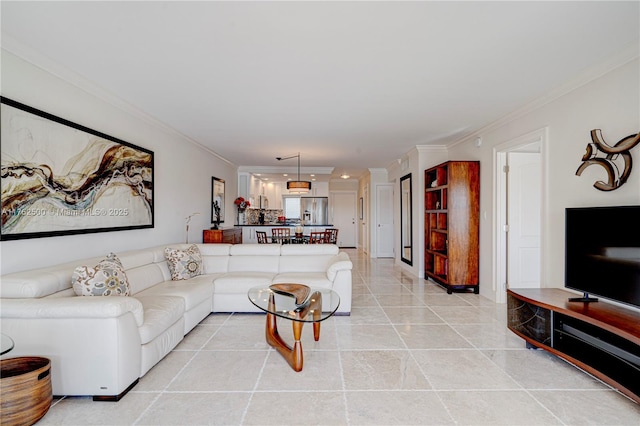 living room with light tile patterned floors and ornamental molding