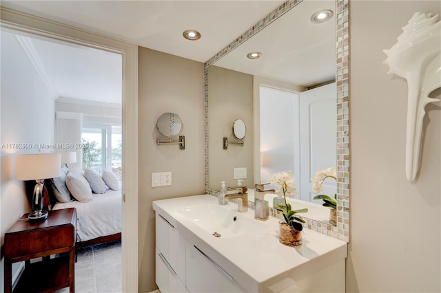 bathroom with vanity, ensuite bath, recessed lighting, crown molding, and tile patterned floors