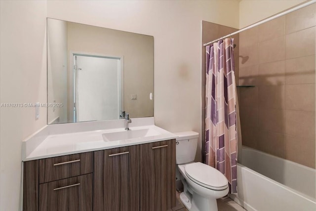 bathroom featuring toilet, shower / tub combo with curtain, and vanity