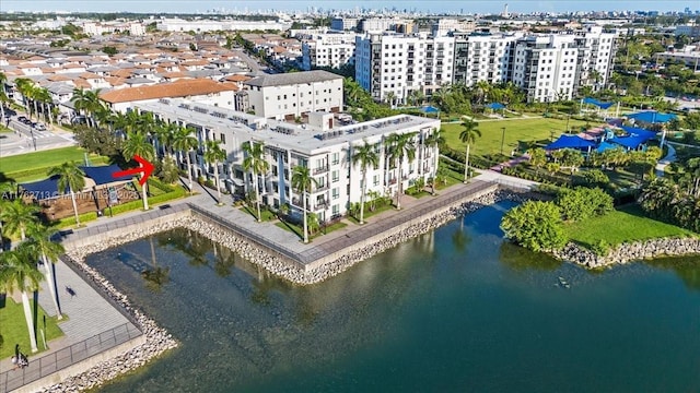 birds eye view of property with a water view