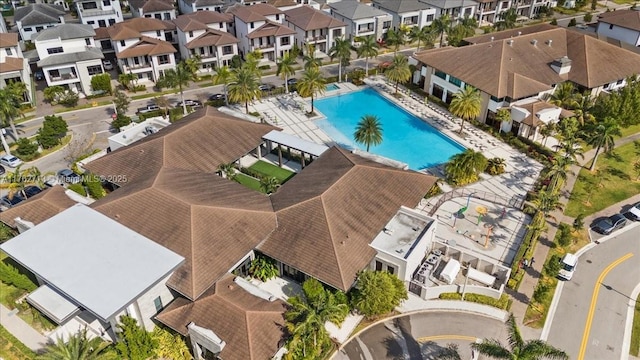 birds eye view of property with a residential view