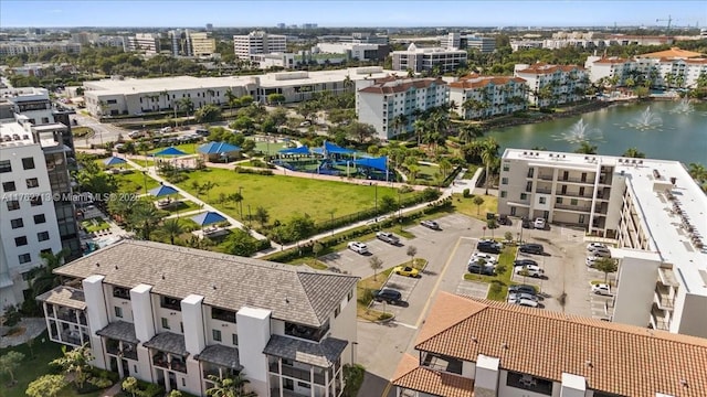 birds eye view of property featuring a water view