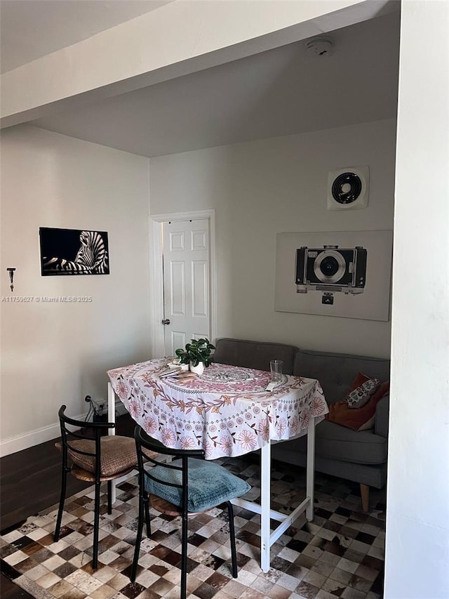 dining space with baseboards