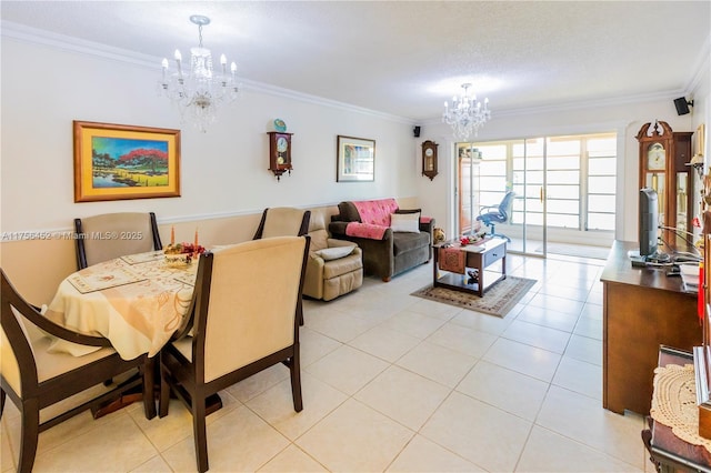 dining area featuring a chandelier, crown molding, and light tile patterned flooring