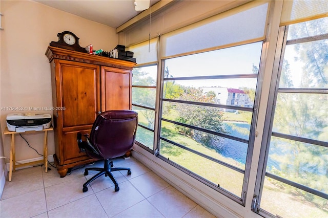 office space with light tile patterned floors