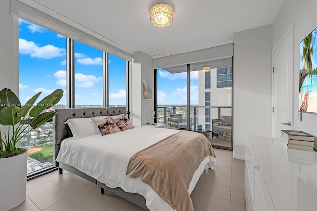 tiled bedroom with access to outside